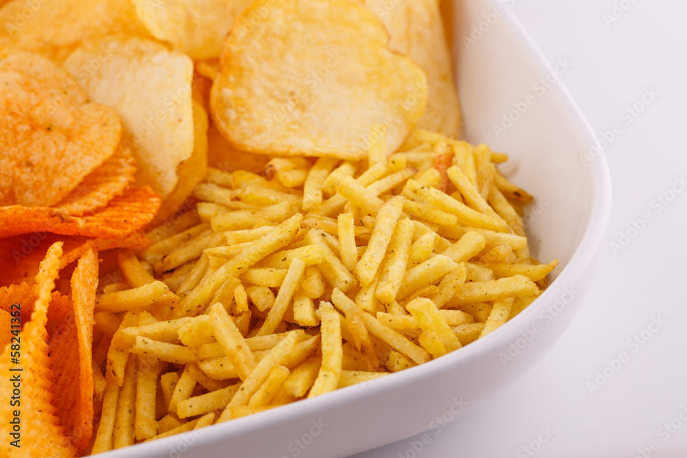 Potato chips in bowl Potato chips in bowl