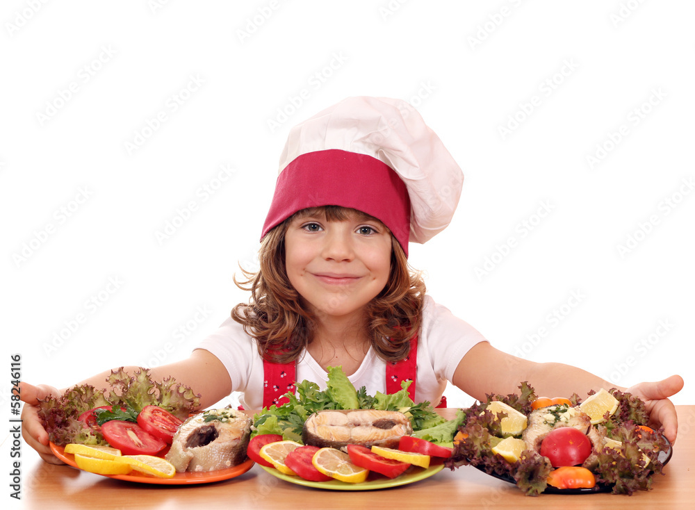 beautiful little girl cook with prepared salmon seafood beautiful little girl cook with prepared salmon seafood