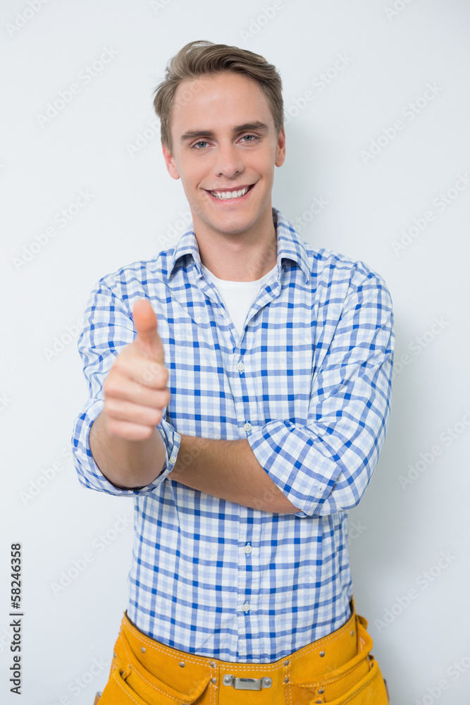 Portrait of a handyman gesturing thumbs up Portrait of a handyman gesturing thumbs up