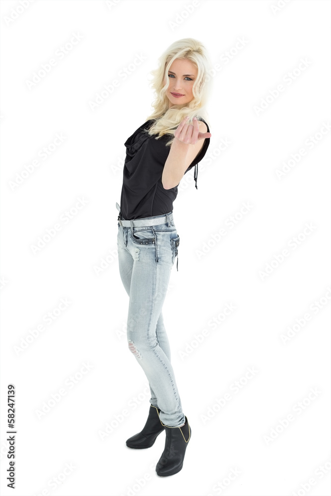 Full length portrait of casual woman with blonde hair Full length portrait of casual woman with blonde hair