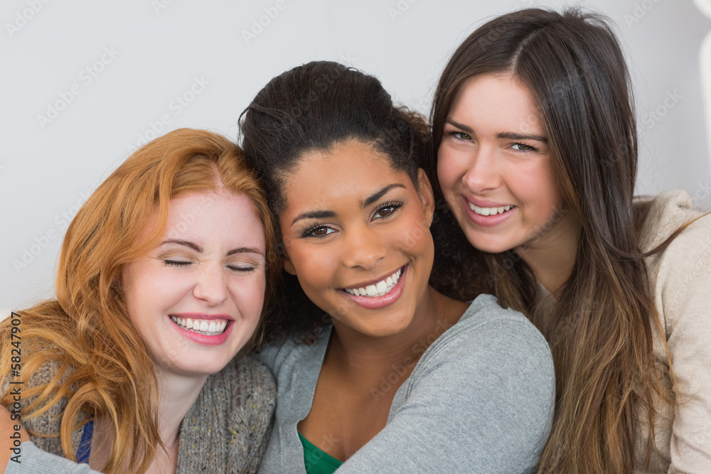Close up portrait of cheerful young female friends Close up portrait of cheerful young female friends