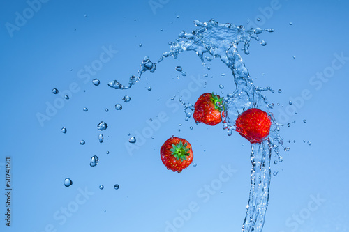 strawberries with water spray