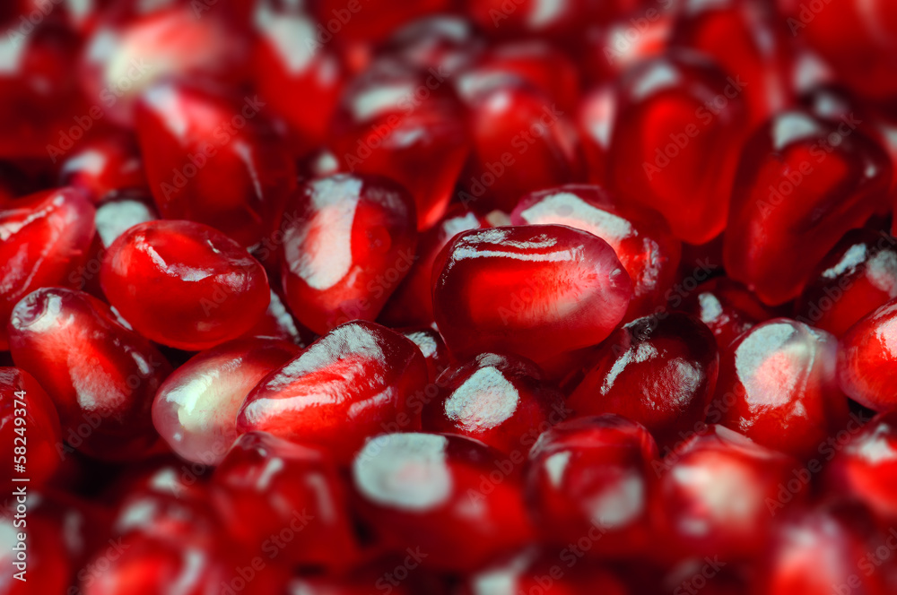 Pomegranate seeds close up macro studio shot Pomegranate seeds close up macro studio shot