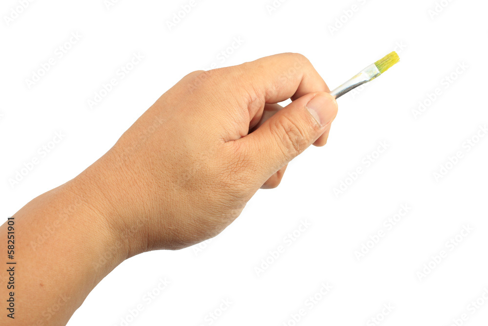 Hand holding paint brush isolated on white Hand holding paint brush isolated on white