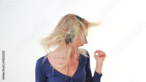 beautiful woman dancing with headphones