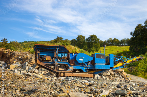 Obraz na płótnie Stone crushers in the mountains at a quarry. w salonie