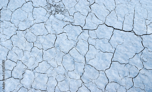 Cracked white clay texture