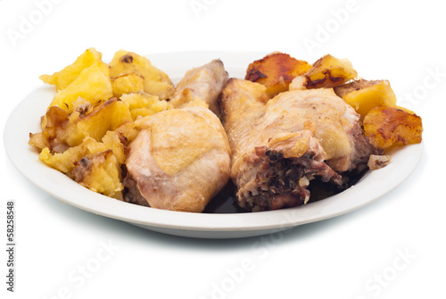 grilled chicken leg and potatoes