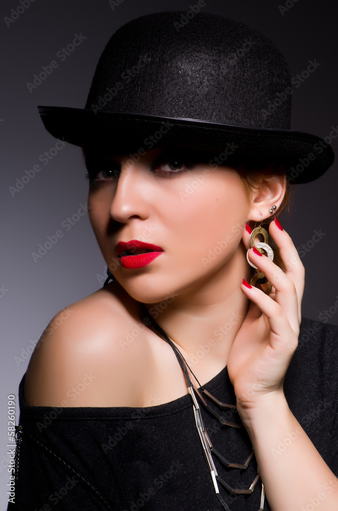 Woman in retro concept in dark room