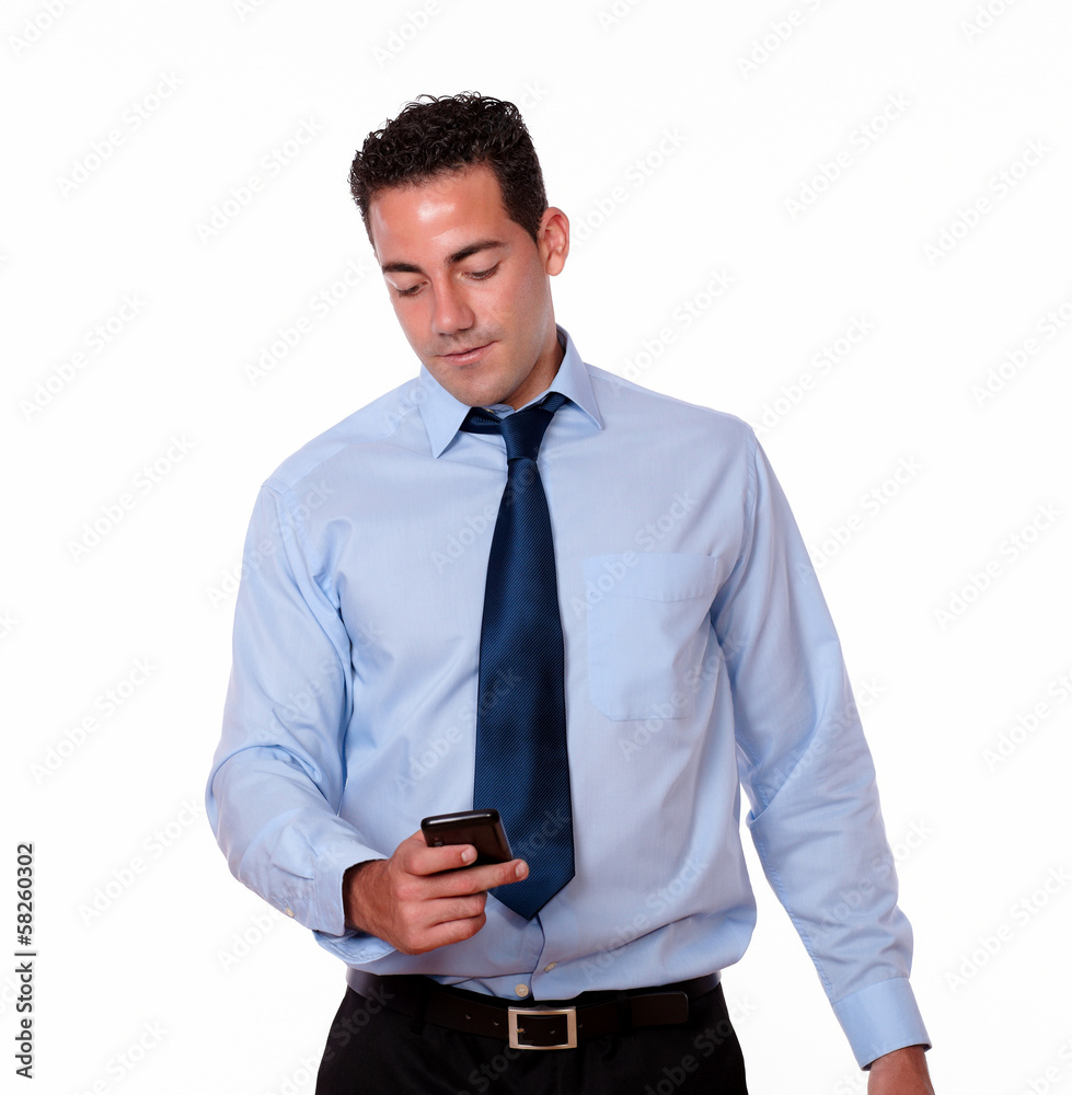 Handsome adult male using his cellphone Handsome adult male using his cellphone