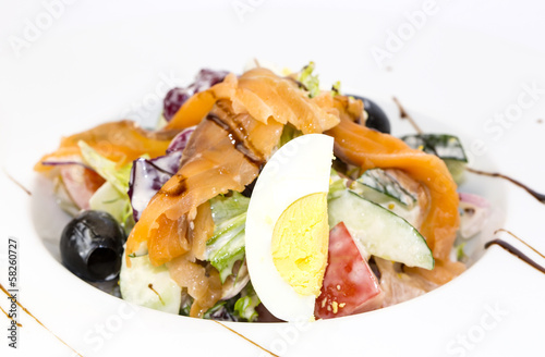 seafood salad vegetables and eggs on a white background