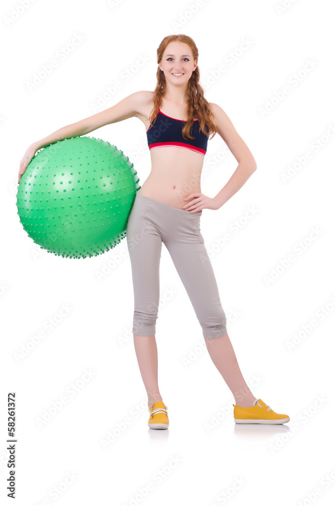 Woman exercising with swiss ball on white Woman exercising with swiss ball on white