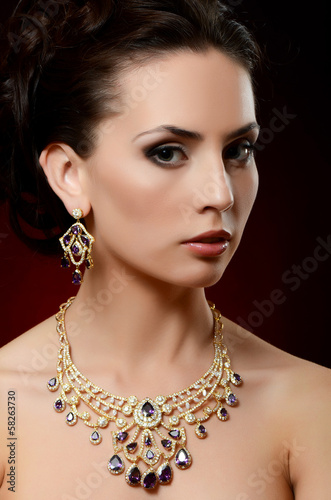 The beautiful woman in expensive pendant