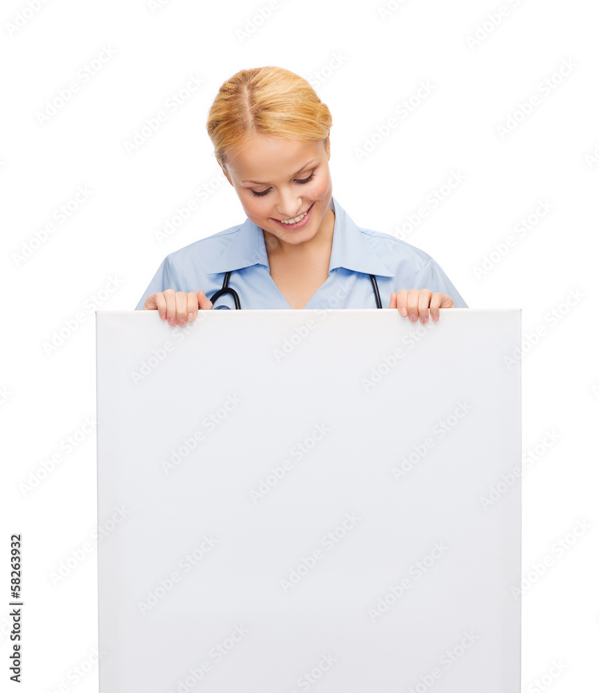 smiling female doctor or nurse with blank board smiling female doctor or nurse with blank board