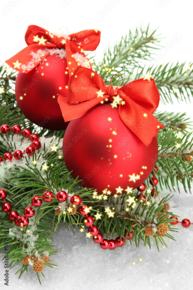 Christmas balls on fir tree with snow, isolated on white Christmas balls on fir tree with snow, isolated on white