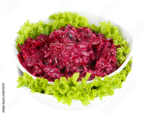 Beet salad on plates isolated on white