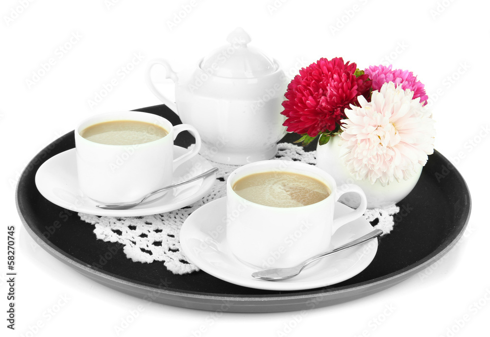 Cups of coffee on tray isolated on white