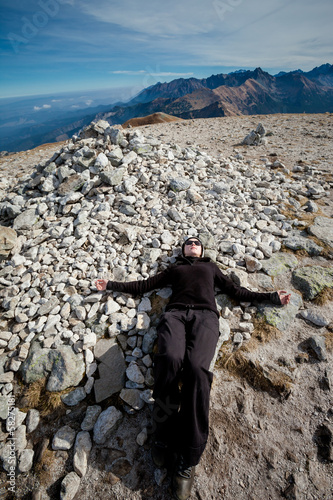 Young tourist in beautiful Tatry mountains photo