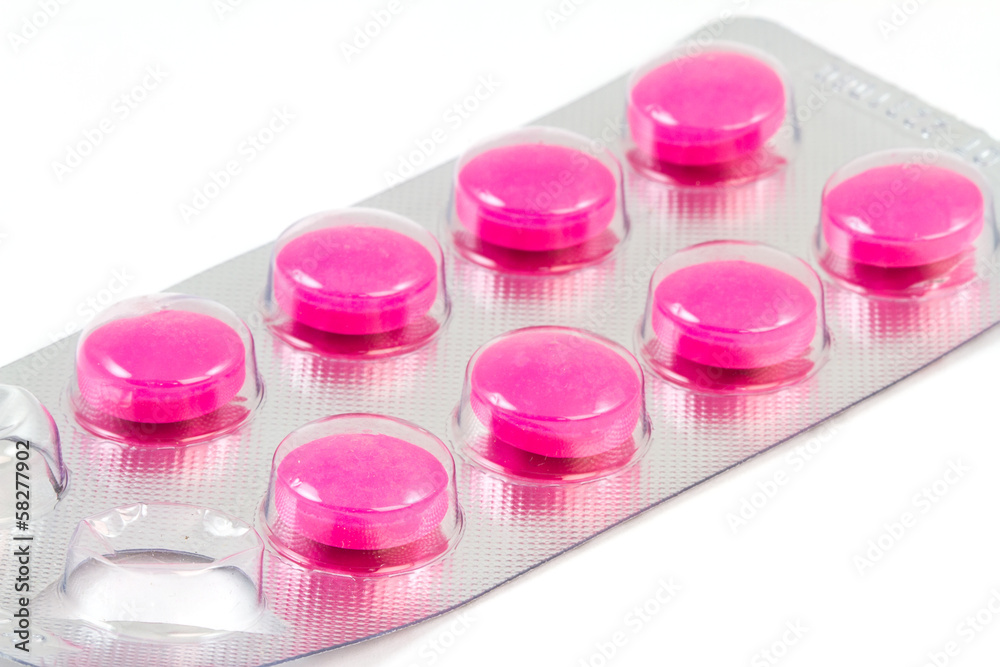 Colorful pills closeup on white background Colorful pills closeup on white background