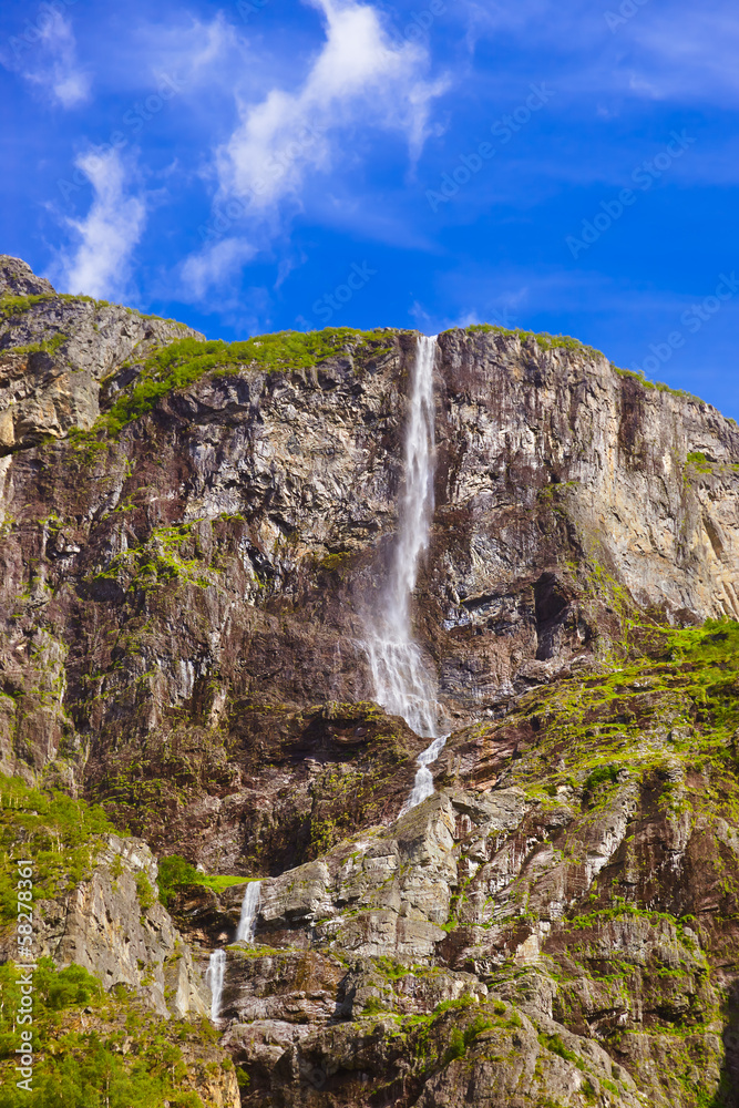 Waterfall in Fjord Sognefjord - Norway Waterfall in Fjord Sognefjord - Norway
