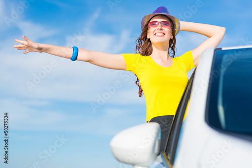 Young woman got out of car window