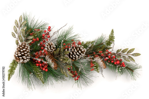 Christmas garland  with red berries and pine cones on white
