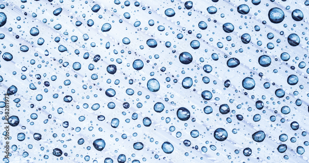 Water drops on a plastic background.