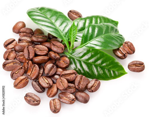 Roasted coffee beans and leaves.