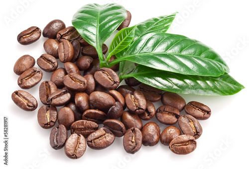 Roasted coffee beans and leaves.
