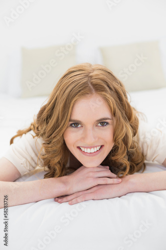 Close up portrait of a pretty woman in bed © lightwavemedia