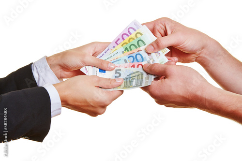 Hands pulling on Euro money bills