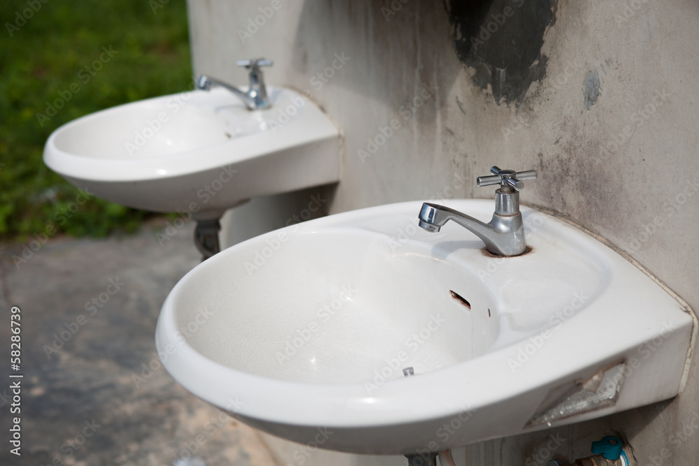 The old ceramic hand wash basin The old ceramic hand wash basin