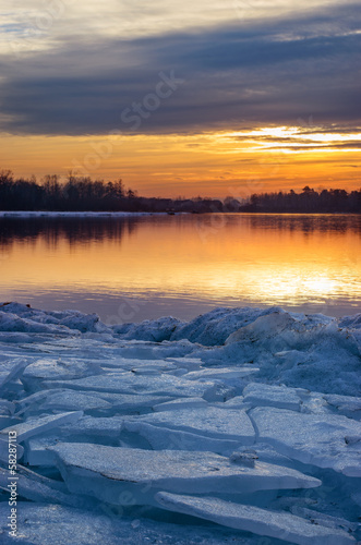 Sunset on the icy shore. © subject