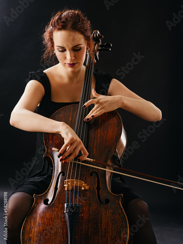 Obraz na płótnie Beautiful female playing the cello