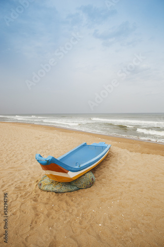 Fishing boat on the beach, Chennai, Tamil Nadu, India © imagedb.com