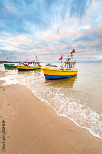 Fishing boats on the beach of Baltic Sea in Poland