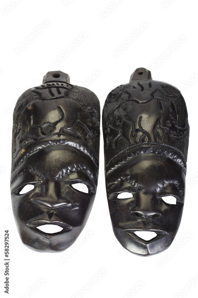 Close-up of two wooden masks Close-up of two wooden masks