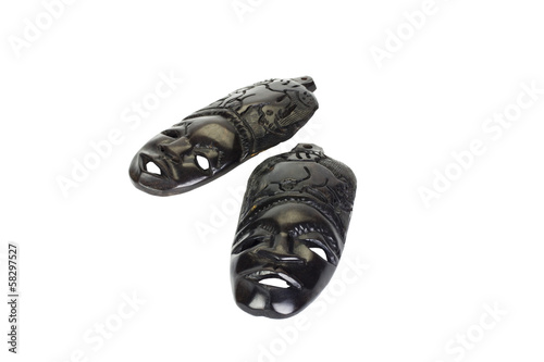 Photography Close-up of two wooden masks