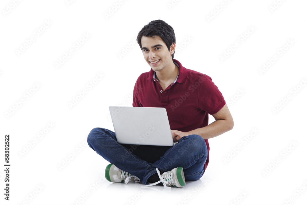 Happy man using a laptop Happy man using a laptop