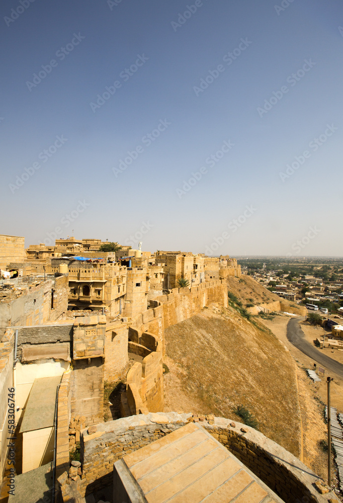 High angle view of Jaisalmer Fort with town in the background, Jaisalmer, Rajasthan, India