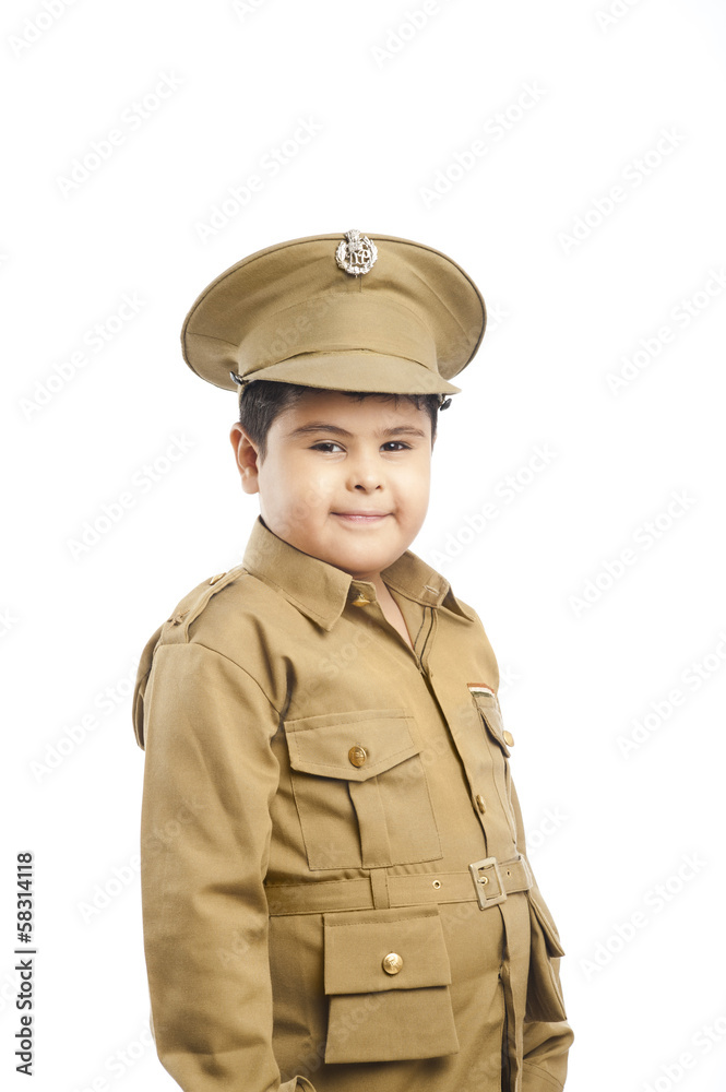 Close-up of a boy dressed as a police uniform smiling Close-up of a boy dressed as a police uniform smiling