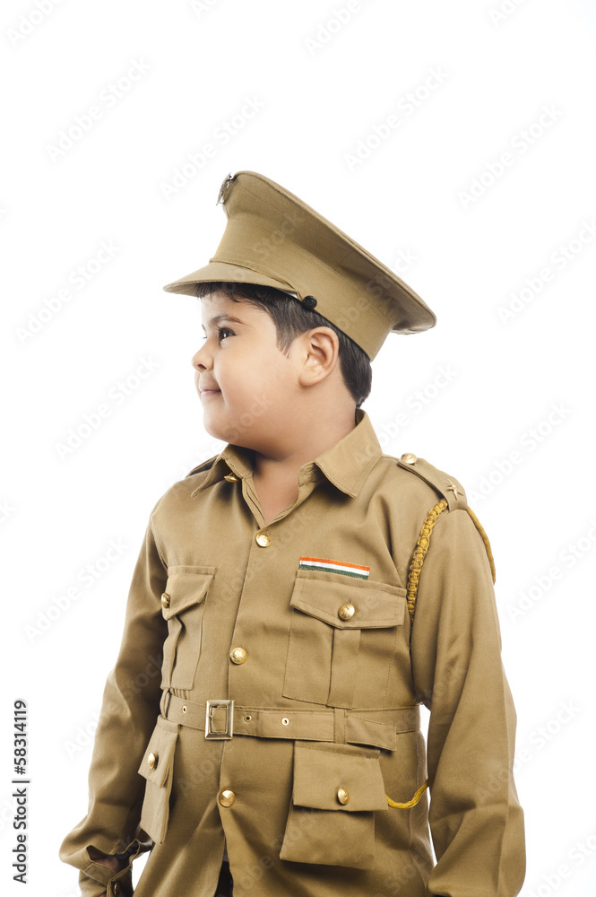 Close-up of a boy dressed as a police uniform Close-up of a boy dressed as a police uniform