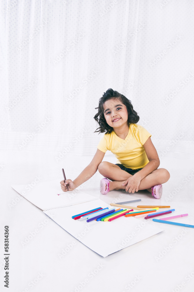 Portrait of a girl making a drawing Portrait of a girl making a drawing