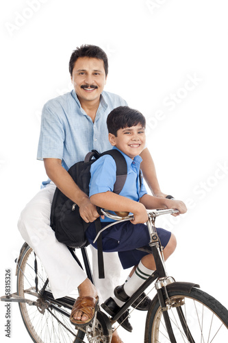 Man with son on bicycle