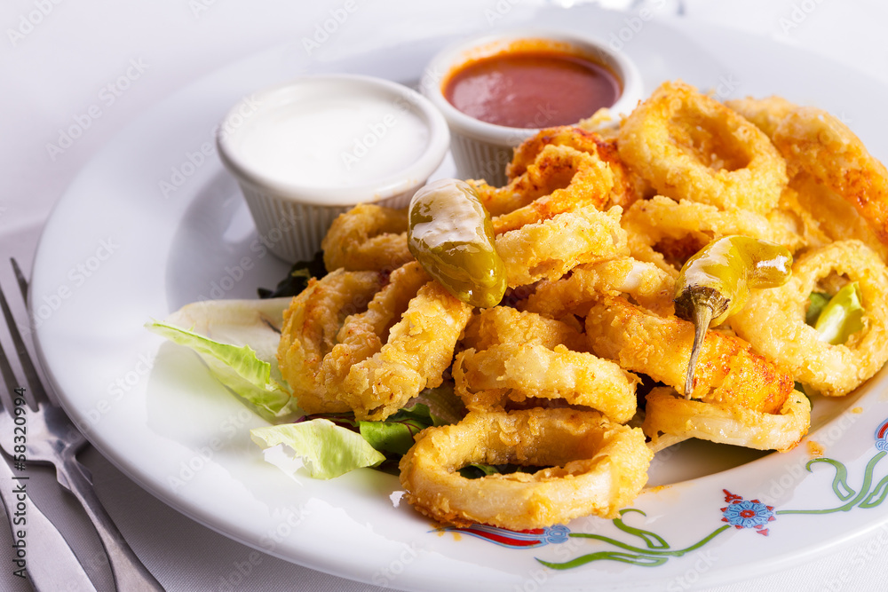 Deep Fried Calamaris Served with Red and White Sauce Deep Fried Calamaris Served with Red and White Sauce