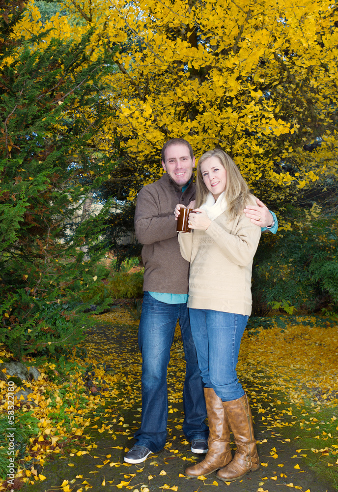 Adult Couple enjoying their time in the park Adult Couple enjoying their time in the park