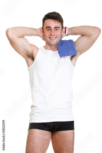 Healthy happy young man thumb up towel isolated
