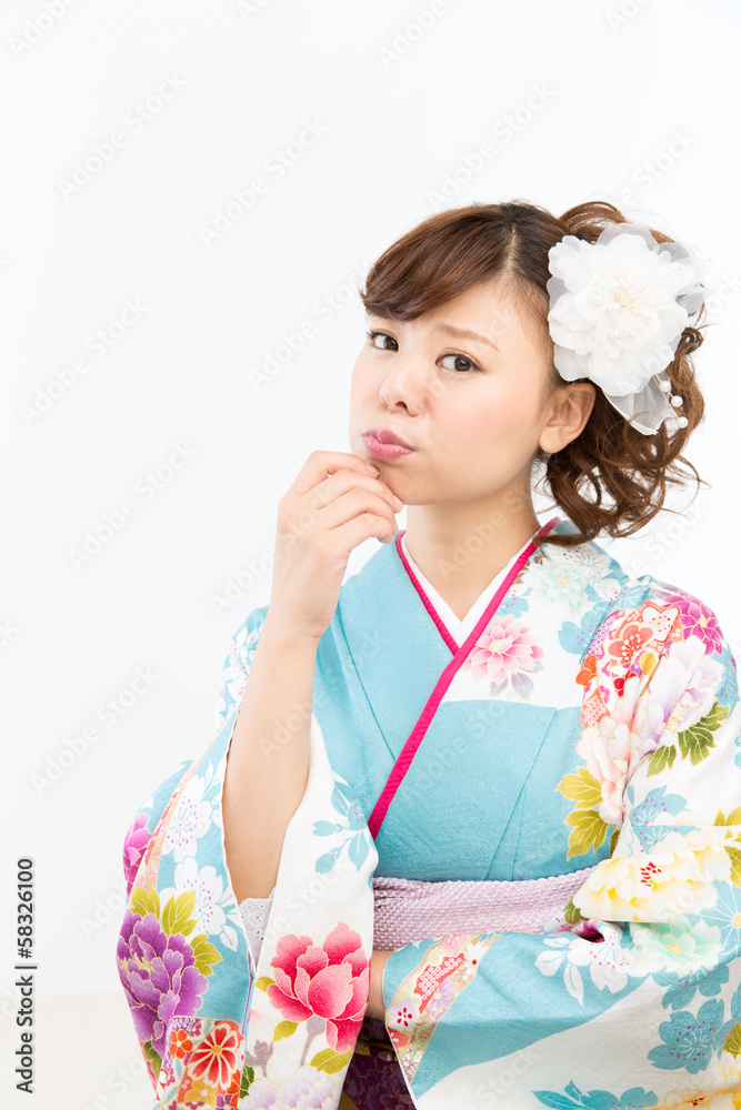 Beautiful asian kimono woman on white background Beautiful asian kimono woman on white background
