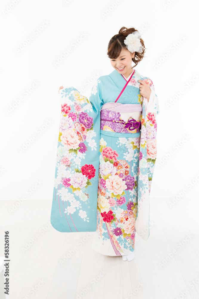 Beautiful asian kimono woman on white background Beautiful asian kimono woman on white background