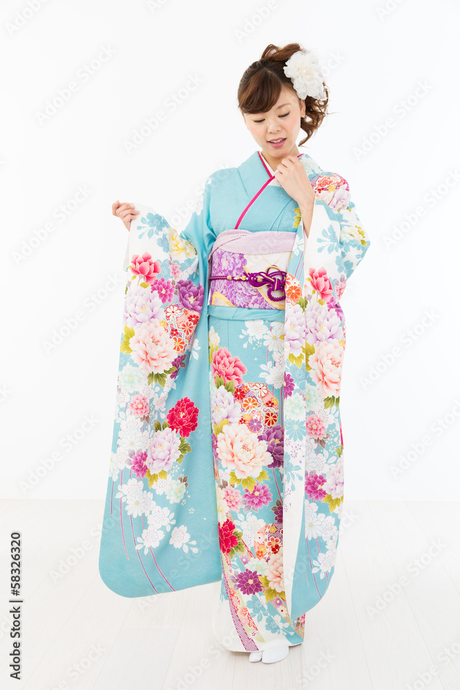 Beautiful asian kimono woman on white background